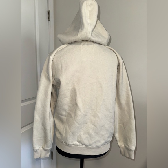 Cream Nautica Hoodie with bold, stitched, navy “NAUTICA” lettering across the ch - Picture 6 of 7